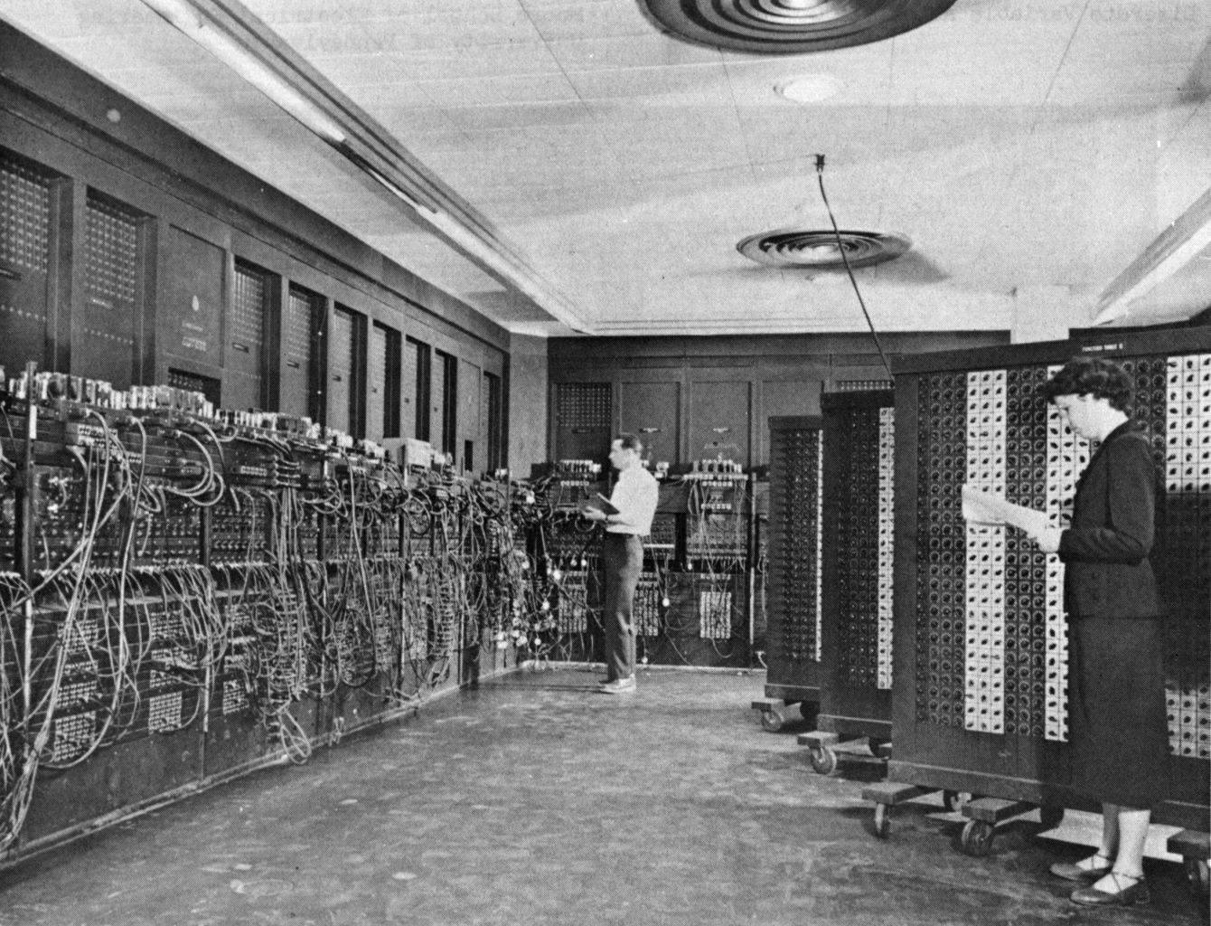 Two programmers at the panels and cabling of the ENIAC, around 1947